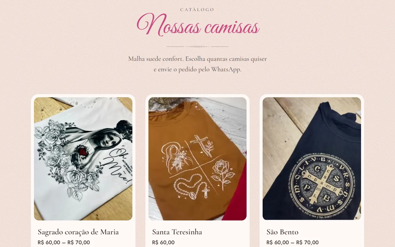 Catálogo do site Camisas Eis-me Aqui, com o título Nossas camisas e fotos das camisas Sagrado coração de Maria, Santa Teresinha e São Bento